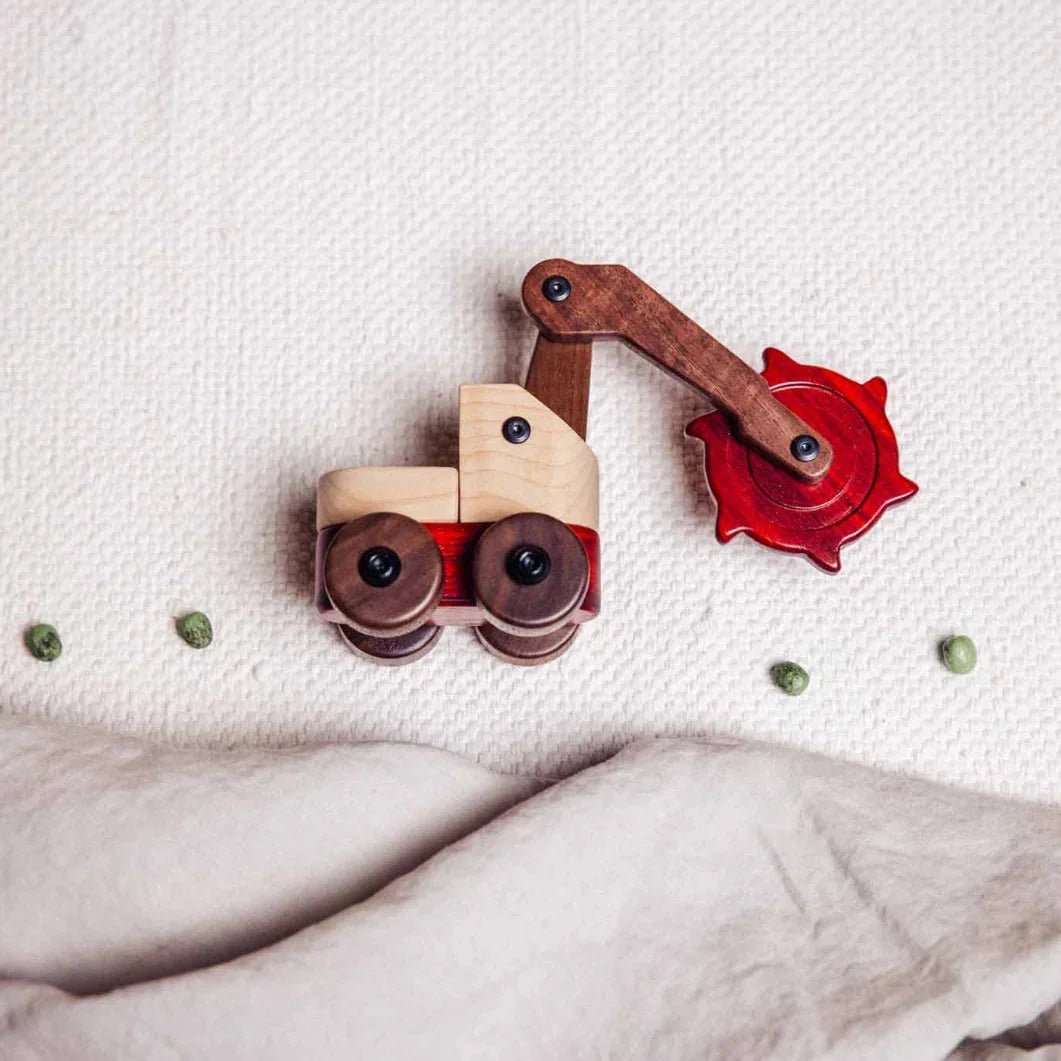 Complete Wooden Vehicles Set saw machine from above, maple cab and walnut arm with a padauk blade on cream knit